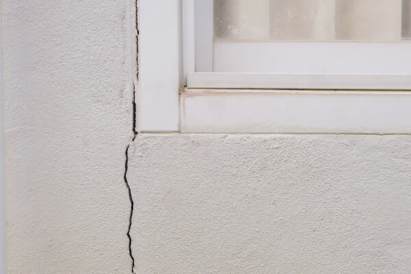 Cracked concrete wall indicating the need for home foundation repair